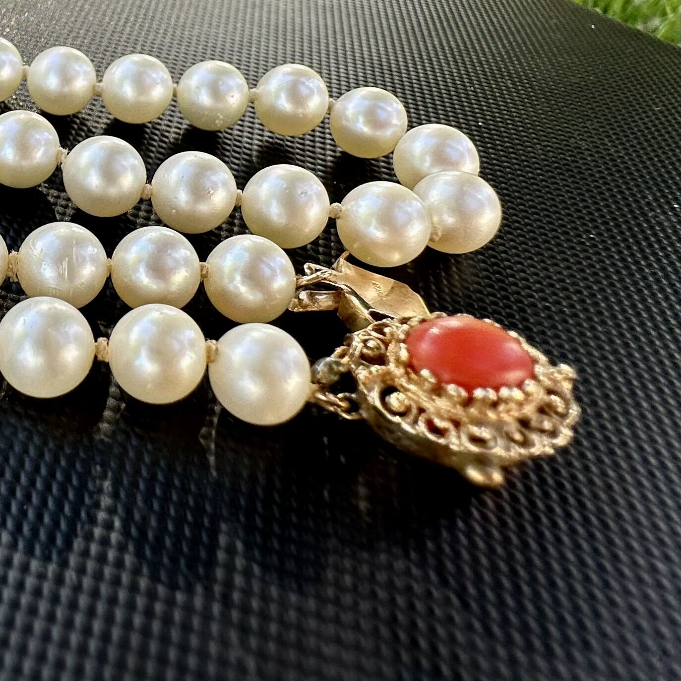 Individually Knotted Pearl Necklace with 14K Yellow Gold Coral Clasp